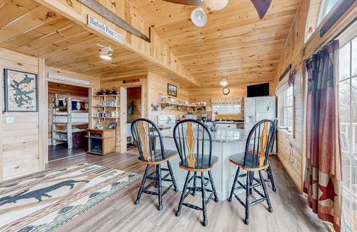Greenville Junction House | Lake-view two-story home with beach access, wood stove, grill, W/D, & fast WiFi