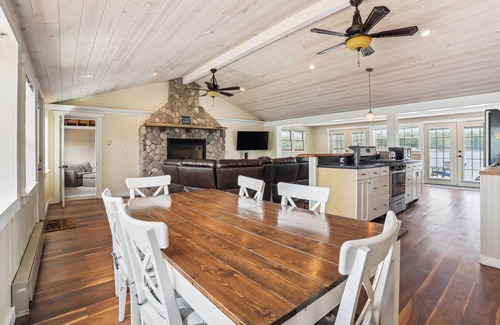 Gladwin Cottage | Lakefront Gladwin Vacation Rental w/Deck & Dock!