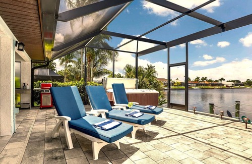 Pelican House | Lakefront Luxury Paradise: 80ft Waterfront, Private Pier & Heated Pool Oasis!