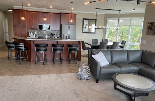 Arnolds Park Condo | Lakefront Luxury! Spacious corner condo, wrap around deck. 6 BB waterpark passes