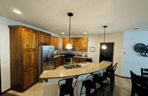 Arnolds Park Condo | Lakefront Okoboji Condo at Bridges Bay! Coronado Condo #100. Sleeps 10.