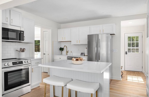 Gladwin House | Lakeshore Living - Private Beach, Sleeps 16!