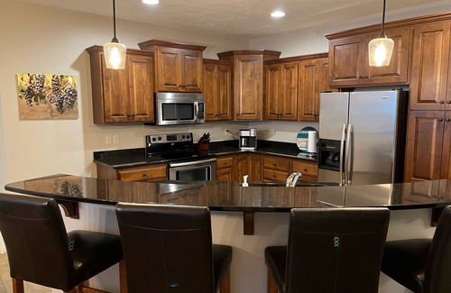 Arnolds Park Condo | Lakeside Luxury Sunsets Await! Modern Bridges Bay Condo with 6 waterpark passes