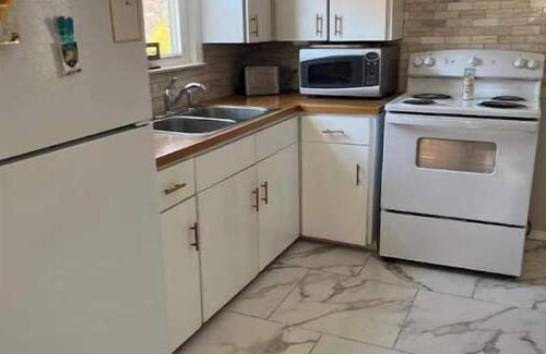 Highland Falls Cottage | Less than a mile from West Point! Lovely Cape Cod alongside a rolling brook.