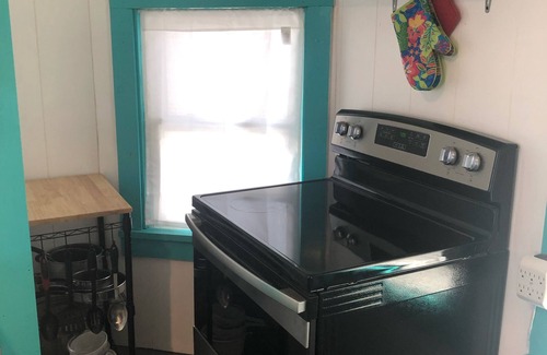 Arnolds Park Cottage | Lisa Cottage located 5 min walk from Arnolds Park!