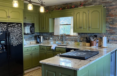 Frank House | Long range views. Sleeps 10! Hot tub, game tables and close to everything!