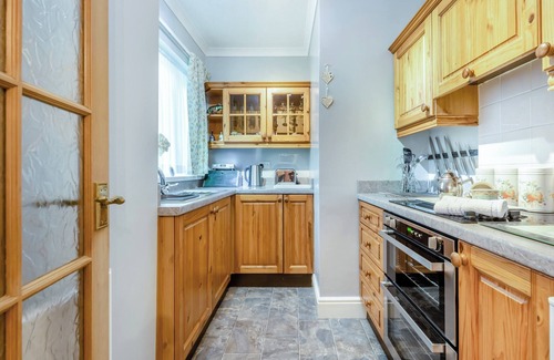 Oakford Cottage | Lovely bungalow situated on a fishery just 4 miles from Aberaeron harbour town.