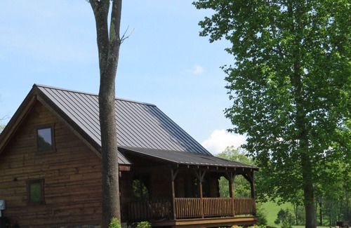 Faber Cabin | Luxurious Log Cabin On 200 Acres Overlooking Private Lake.