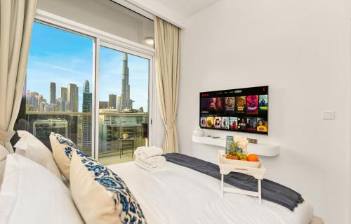 Downtown Dubai Apartment | Luxury Apartment with Balcony & Full Burj Khalifa View by Dejaview Stays
