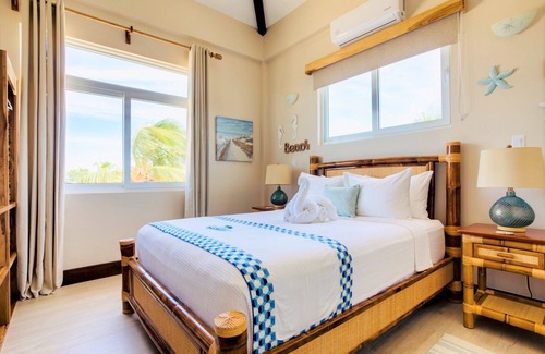 Placencia Resort | Luxury Beachfront Suite with swim up pool bar