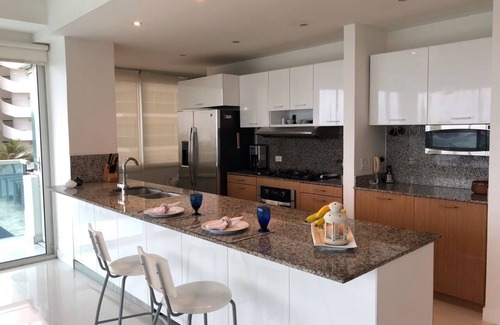 La Boquilla Condo | Luxury & Comfort Steps from the Beach- 2 Pools! Family Friendly & Gourmet Cook!