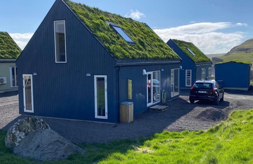 Faroe Islands House | Luxury Cottage in Serene Nature - Okkara summarhús á Sandi