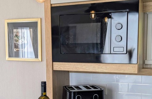 Tattershall House | luxury lake view 8 berth caravan at tattershall lakes pet friendly + hot tub