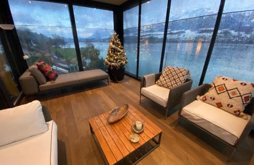 Hessigkofen House | Luxury loft on top of Villa Wilen with tremendous views by the lake