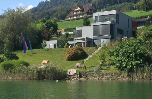Hessigkofen House | Luxury loft on top of Villa Wilen with tremendous views by the lake