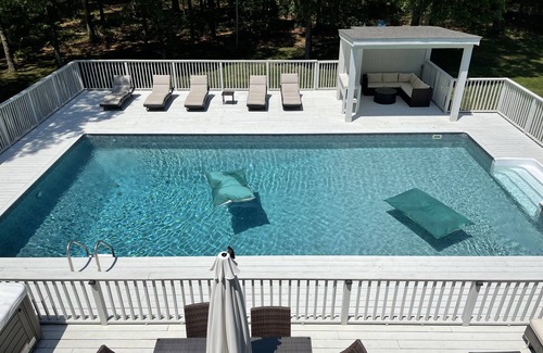 East Hampton House | Luxury, private, gated heated pool, hot tub, fenced in property! Child friendly!