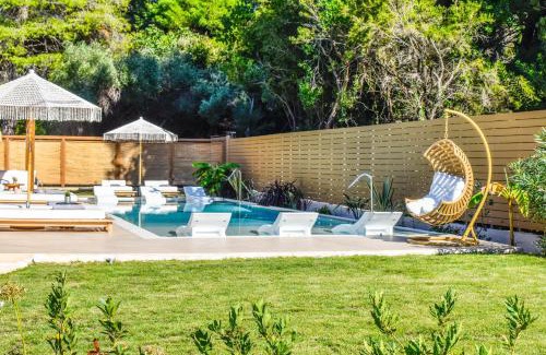 Koukounaries Hotel | Mandraki Village Boutique Hotel