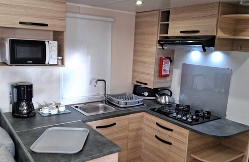 La Cote Radieuse RV Rental | Mobile Home 'Mobil-home Camping Mar Estang' with Lake View, Shared Pool and Air Conditioning