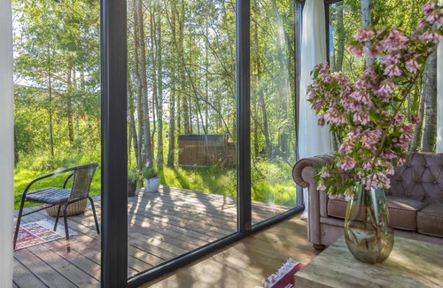 Gratiskes Other | Modern and specious riverside cabin with hot tub