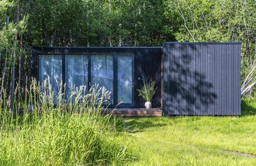 Gratiskes Other | Modern and specious riverside cabin with hot tub