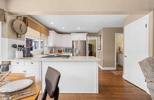 West Edmonton House | Modern Eclectic Home~Walk to WEM~AirCon~Yard~Hot Tub