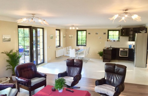 Vsenory Villa | Modern Family Villa with Private Garden, Pool & Parking – 20 Min to Prague