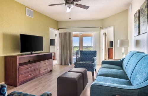 West Kissimmee Hotel | Moments from Theme Parks! Outdoor Pool, Full Kitchen, Free Shuttle!
