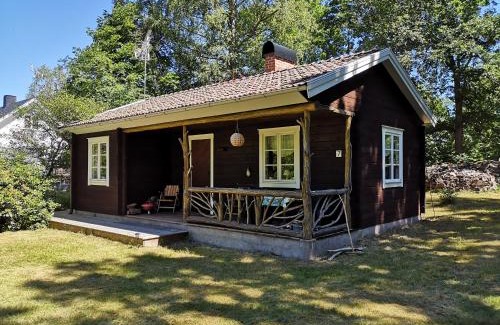 Froseke House | Mysig stuga med öppen spis och uteplats