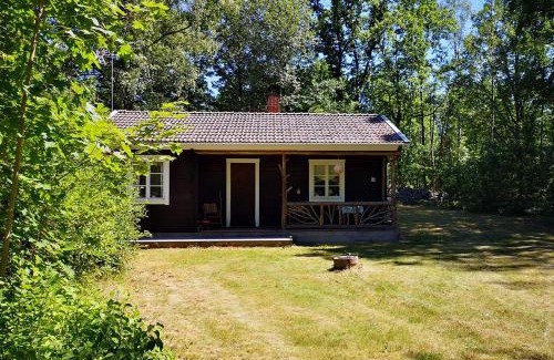 Froseke House | Mysig stuga med öppen spis och uteplats