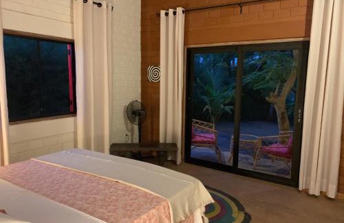 Ouidah Villa | Natura luxury red house