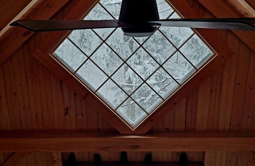 Craftsbury Cabin | Northwoods Guest Cabin & porch overlooking private woods and stream