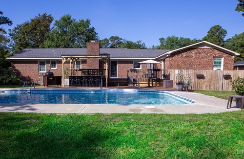Wilmington House | Oasis in the middle of town for large groups with pool and 2 Master bedrooms.