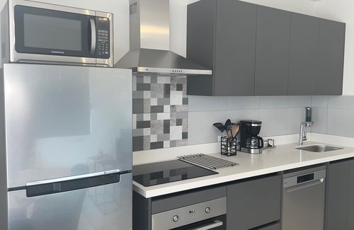 Oranjestad Condo | Oceanfront 1BDRCondo: 2x Queen-Beds|Pool|Full-Kitchen|SofaBed|Mini-Beach|Dock