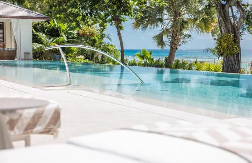 Sunset Crest Villa | One Beachlands - Luxury Beachfront Mansion