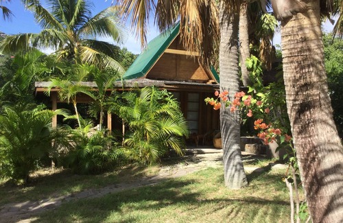 Anse du Gouverneur House | One bedroom cottage located a step away from Saline beach