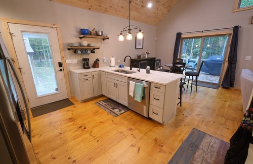 Mears House | Our Neck of the Woods, Mears. A Modern Rustic Feel that is EV-friendly.
