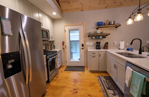 Mears House | Our Neck of the Woods, Mears. A Modern Rustic Feel that is EV-friendly.
