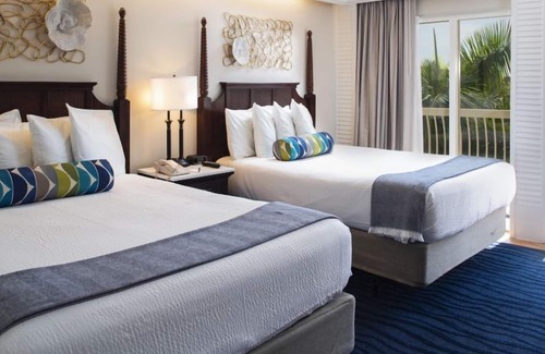 St. Pete Beach Hotel | Perfect for Groups! With Kitchenette and Stunning Tropical View, Onsite Pools!