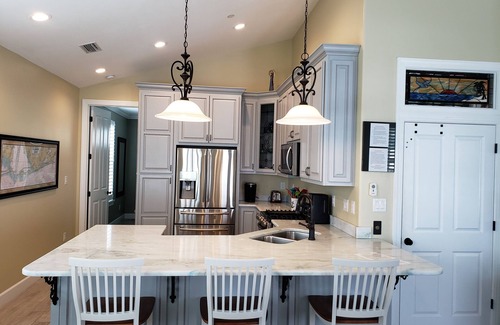 Cotton Bayou House | Pet Friendly, Boaters Paradise, 2 Boat Slips, Covered Outdoor Kitchen & Pool