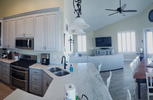 Cotton Bayou House | Pet Friendly, Boaters Paradise, 2 Boat Slips, Covered Outdoor Kitchen & Pool
