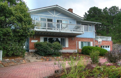 Village Seven House | PICTURESQUE BLUFF SIDE APARTMENT IN HOME