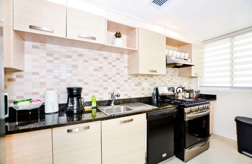 Bavaro Condo | Playa Turquesa - B-201 - Premier Beachfront Ocean & Garden View - 80mbps Wifi