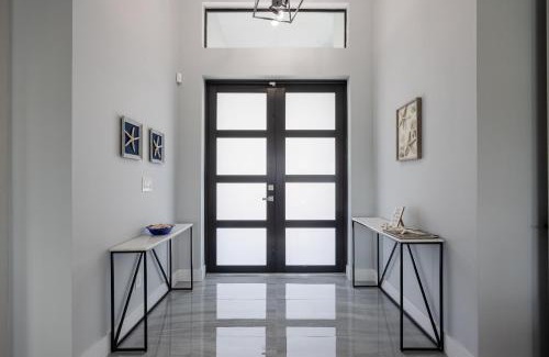 Trafalgar House | Pool overlooking canal, Outdoor Grilling station - Villa Sand Dollar Siesta