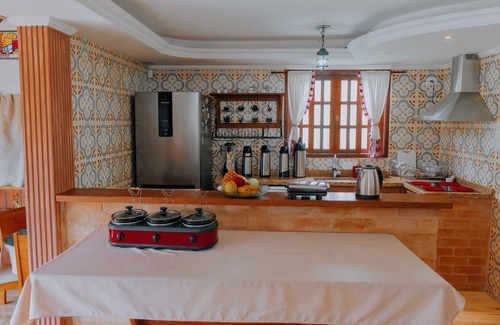 Vila Telma Hotel | Pousada Araucária Suítes