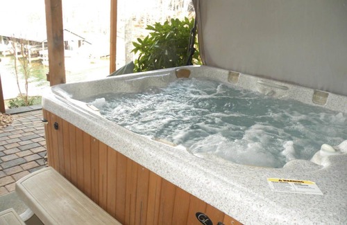 Huddleston House | Power down as hot tub, kayaks, and pool table await, water "footsteps away".