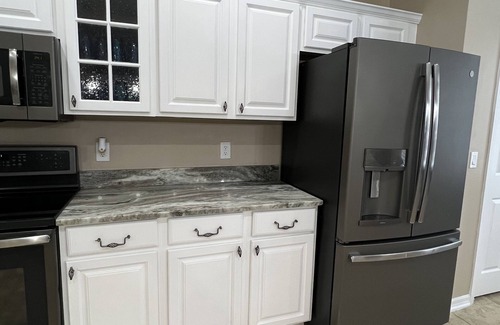 Eustis House | Prepared to be impressed! Welcome home! 7 bedroom 4 bathroom with HEATED pool!
