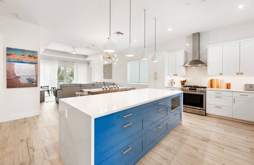West Bay Condo | Private 7 Mile Beach Beach Club. Ocean views from Roof Terrace and Pool Pavilion