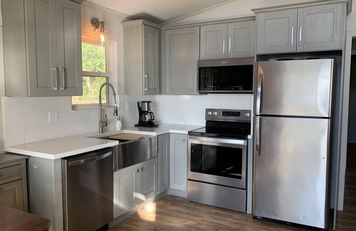 Hawthorne House | Private lakefront home w/large dock, pets welcome, Wi-Fi, kayaks, boat rental.