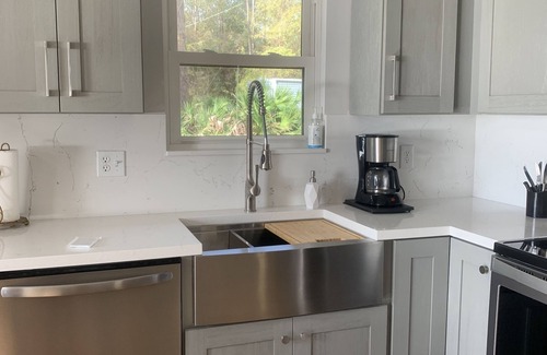 Hawthorne House | Private lakefront home w/large dock, pets welcome, Wi-Fi, kayaks, boat rental.