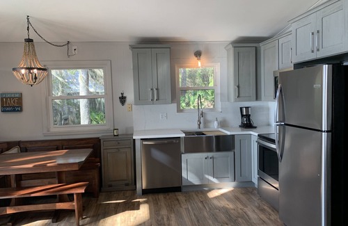 Hawthorne House | Private lakefront home w/large dock, pets welcome, Wi-Fi, kayaks, boat rental.